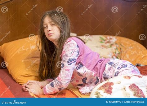 Child Sleepy Yawning In Bed Sleepy Little Girl On The Bed Stock Image