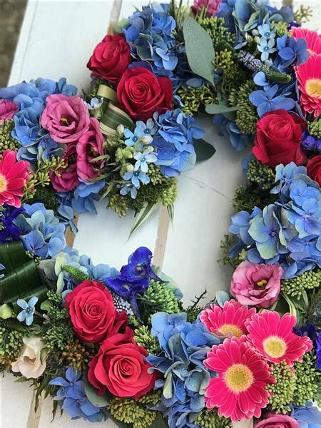 Top quality affordable flowers for funerals. Traditional Open Heart Blue and Pink | Rays Florist ...