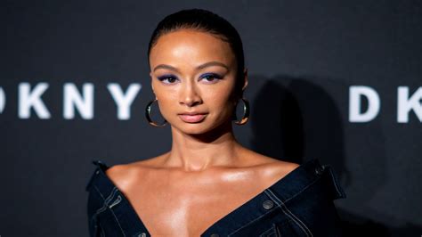 Draya Michele Shows Off Her Extremely Toned Core In Sexy Black Bikini