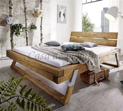 Betten aus holz unterscheiden sich nicht nur in der zu grunde liegenden holzart, sondern auch konstruktionsbedingt: Massivholz Balken-bett 140x200cm Kiefer eichefarbig Holz ...