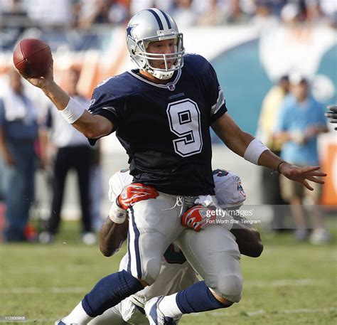 Dallas Cowboys Quarterback Tony Romo Releases A Touchdown Pass To