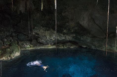 Freediving In A Cenote Cave By Stocksy Contributor Alice Nerr Stocksy