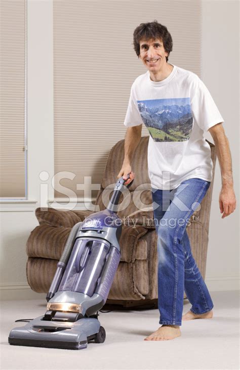 Man Vacuuming Series Stock Photo Royalty Free Freeimages