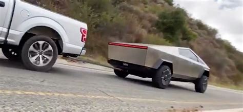 Watch Tesla Cybertruck In Tug Of War Against Ford F150 And Size