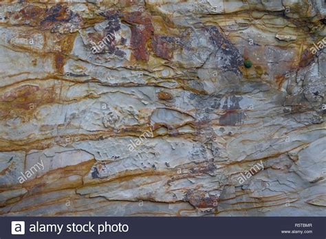 Iron Oxide Or Mineral Staining On A Mudstone Or Shale Cliff Southern
