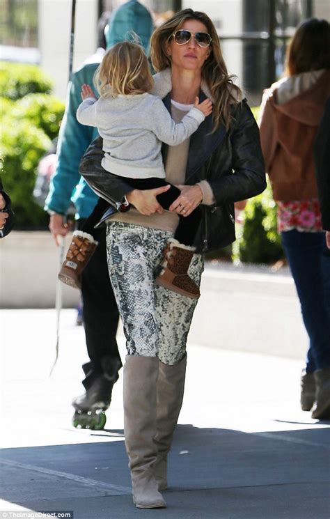 Gisele Bundchen Dotes On Daughter Vivian While Tom Brady Snaps Photos