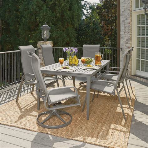 Crafted from cement and natural fibers our stein dining table will complete your industrial inspired outdoor dining space. Home Styles Daytona Charcoal Gray 7-Piece Aluminum Round ...