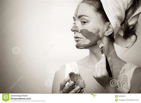 Woman Applying With Brush Clay Mud Mask To Her Face Stock Image Image Of Facial Pamper