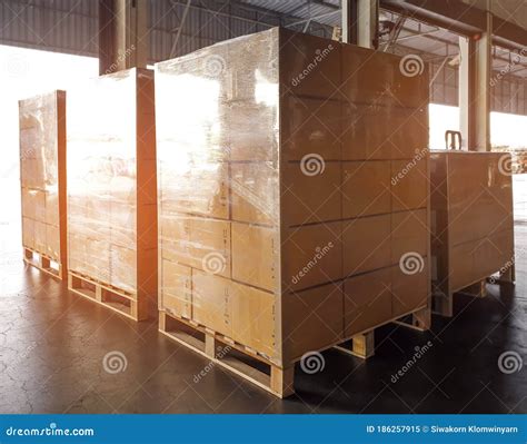 Stack Of Shipments Boxes On Wooden Pallets Interior Of Warehouse Storage Royalty Free Stock