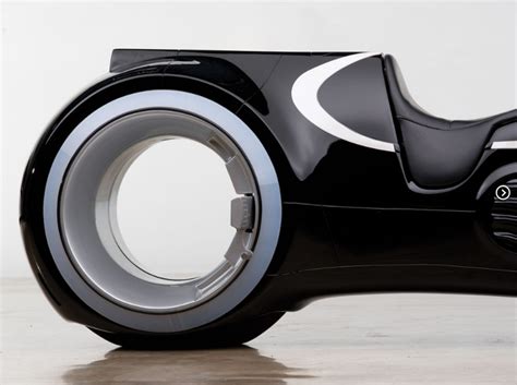 This tron style motorcycle is a fully functional and street legal bike that is powered by a suzuki 996cc engine. Tron lightcycle replica sells for $77,000 | ResCogs