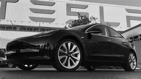 Elon Musk Tweets Photos Of First Tesla Model 3 To Roll Off The Line
