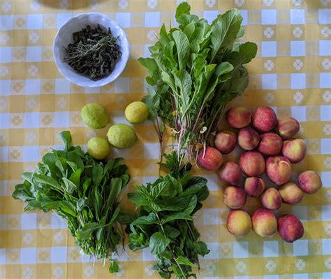From my mother's vast garden: peaches, limes, radish leaves, mint, and arugula. Top left are 