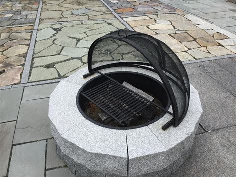 Round steel wood burning fire pit with spark screen this outdoor, wood burning fire pit design this outdoor, wood burning fire pit design provides ample of room for the perfect size fire and is easy to tend and clean. Build a Durable Granite Fire Pit Perfect for Any Outdoor ...