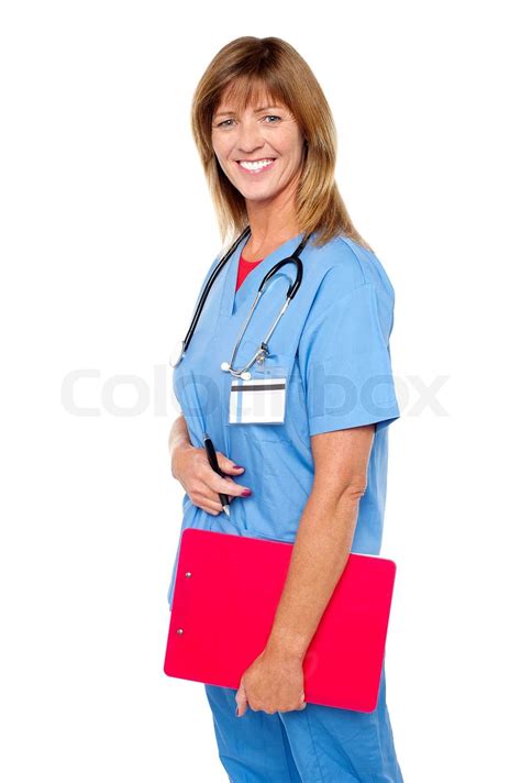 Smiling Medizinische Krankenschwester Mit Zwischenablage Stock Bild