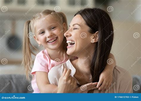 Happy Mom And Daughter Cuddling Playing At Home Stock Image Image Of Happy Emotional 176612703