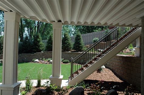 The panels allow the water to flow into a rain gutter. Underdeck Photo Gallery | Under decks, Under deck drainage ...
