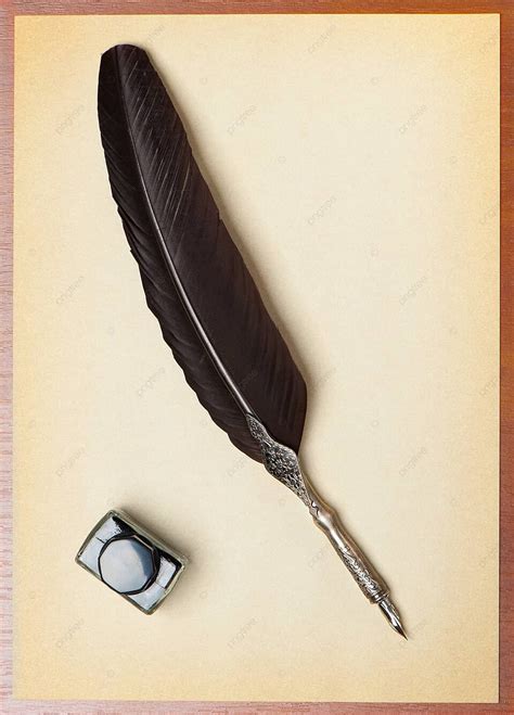 On An Ancient Parchment Feather Quill And Inkwell Photo Background And