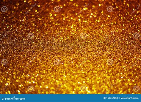 Festive Abstract Gold Glitter Texture Background With Shiny Sparkle