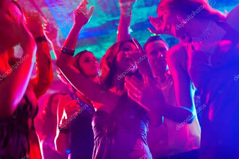 Party People Dancing In Disco Or Club Stock Photo Kzenon