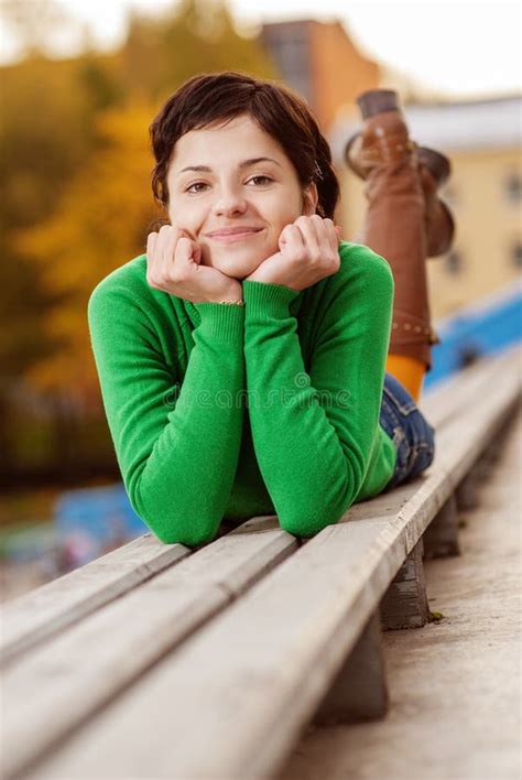 Pretty Young Woman Lying On Bench Stock Photo Image Of Fall Lying