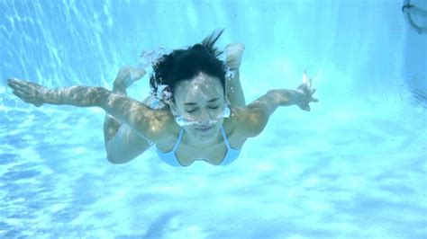 Girl Swimming Underwater In A Swimming Pool Stock Footage VideoHive
