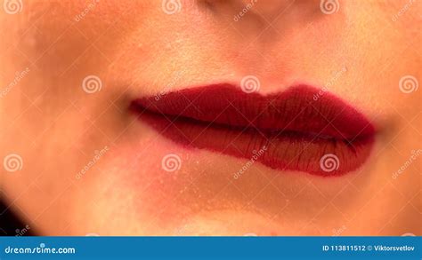 Extreme Close Up Of Woman Biting Her Lower Lip Stock Footage Video Of Caucasian Lipgloss