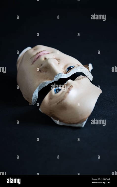 A Split And Broken Face From A Ceramic Bust Of A Man Stock Photo Alamy