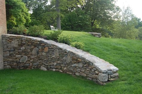 Landscape Stone Walls Pictures Backyard A Curved Stone Wall Connects