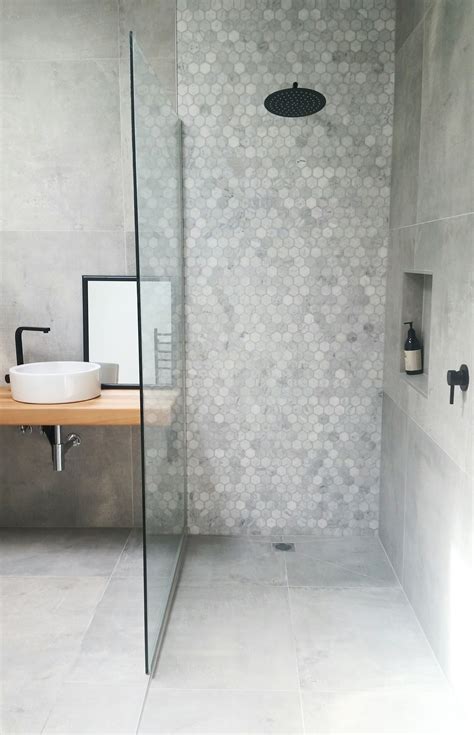 Tiled shower floors are visually appealing as well as hygienic. Contemporary Concrete Look Bathroom | Small bathroom ...