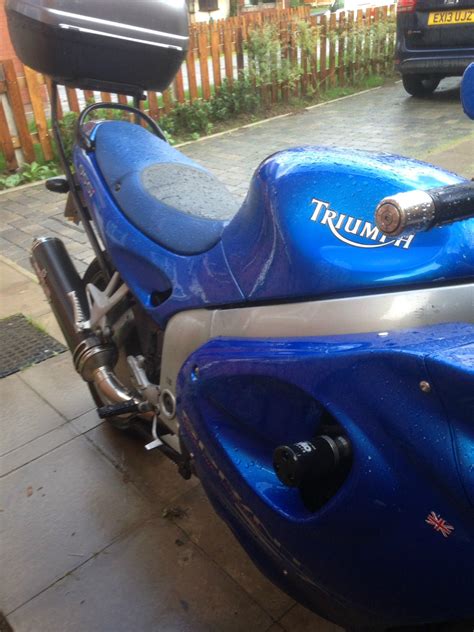 17/43 will give better acceleration in 1st and 2nd, yet will make your top end looking for shift for highway use. Triumph Sprint ST 2003