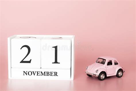 November 21st Day 21 Of Month Calendar Cube On Modern Pink Background