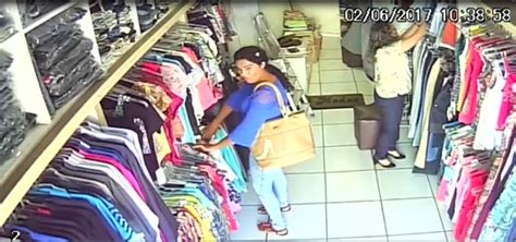 VOZ DE ILHA GRANDE Câmera flagra mulher furtando roupas em loja de