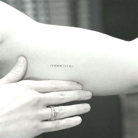 Minimalist Date Tattoo In Roman Numerals On The Right Inner Arm With Images Date Tattoos
