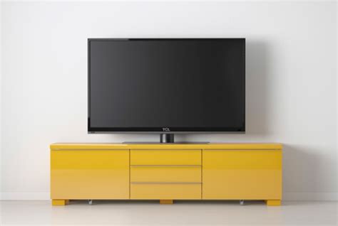It is quadrilateral, made of wood, and takes up lots of space. 50+ Yellow TV Stands IKEA | Tv Stand Ideas