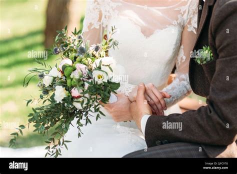 Just Married Couple Holding Hands Close Up Stock Photo Alamy