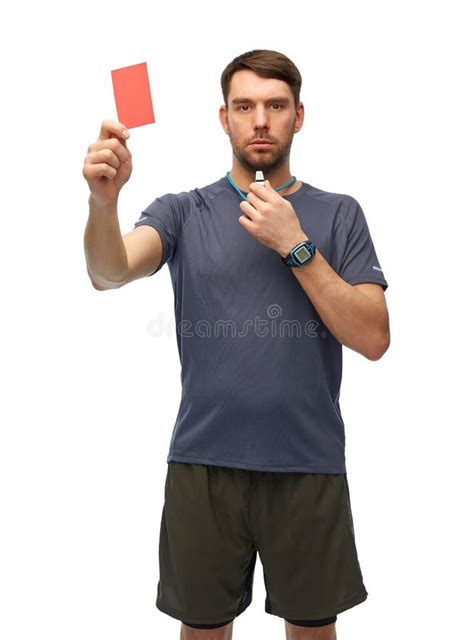 Referee Whistling Whistle And Showing Red Card Stock Photo Image Of