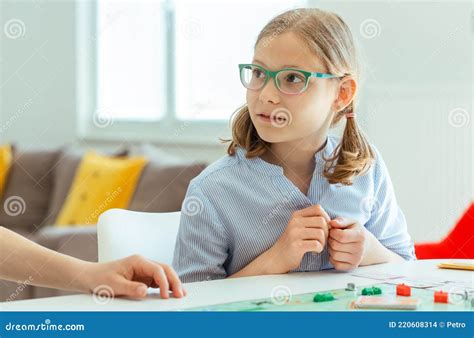 Happy Cute Children Playing Board Games And Having Fun At Home Stock