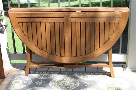 ··· outdoor plastic folding table and chair for sale 1. 48" Round Eucalyptus Hardwood Folding Table with Umbrella Hole