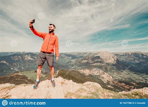 Man In Hiking Gear Taking A Selfie Outside Stock Photo Image Of Alone