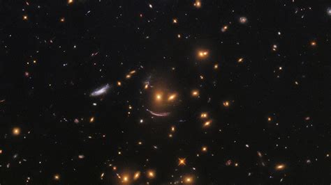 Hubble Space Telescope Snaps Smiley Shaped Cluster Of Galaxies Fox News
