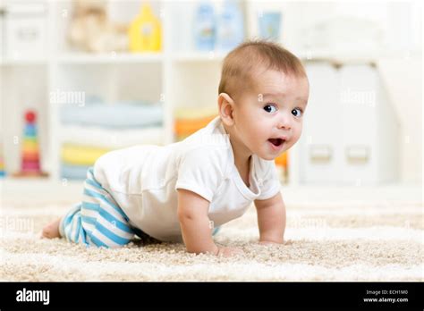 Crawling Baby Boy Indoors Stock Photo Alamy