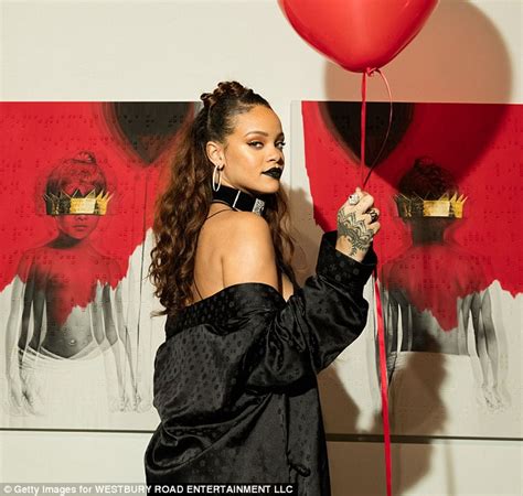 Rihanna Oozes Sex Appeal As She Unveils Her Long Awaited Album Cover