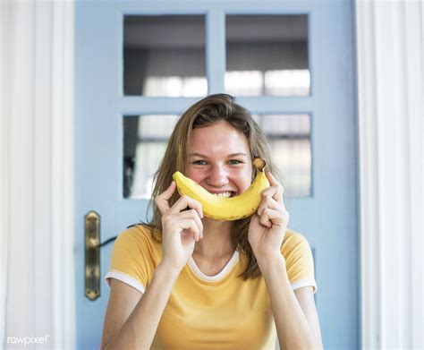 Download Premium Image Of A Caucasian Woman With Banana And A Smile On