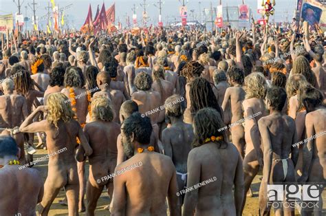 Crowds Of Naked Naga Sadhus Holy Men Participating In The Procession