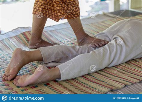 Massage Style Thai Old Culture By Hands And Foot Knead On Body For