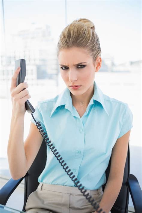 Frowning Stylish Businesswoman Holding The Phone Stock Photo Image Of