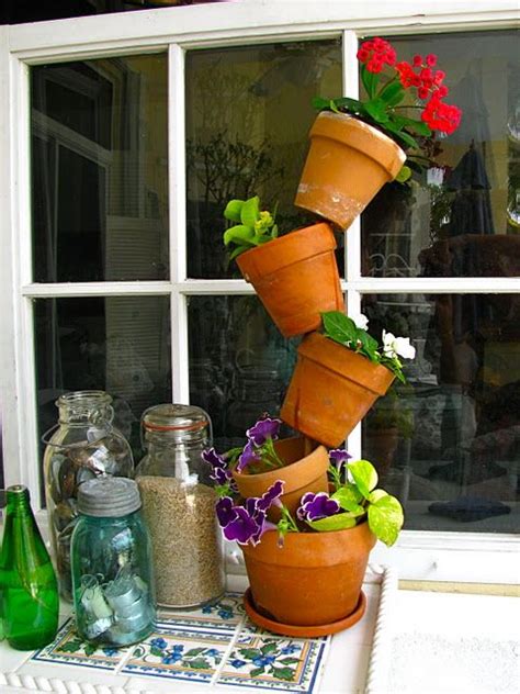 Diy Tipsy Pot Could Go On Front Porch Stacked Flower Pots Stacked
