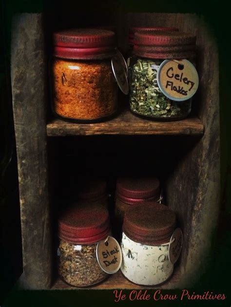 Jars Filled With Spices Sit On Wooden Shelves
