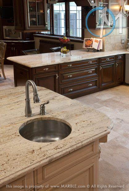 Swirls and speckles of browns. The New Colonial Dream is featured throughout this very ...
