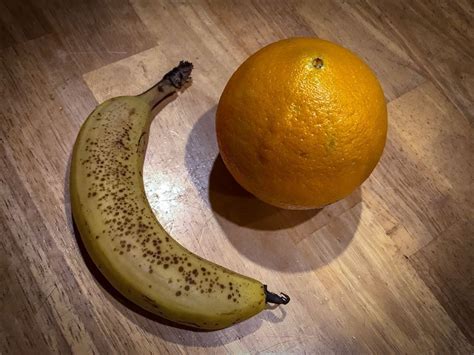 A Massive Orange With A Banana For Reference Pics